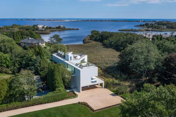 An aerial shot of the home overlooking the ocean.