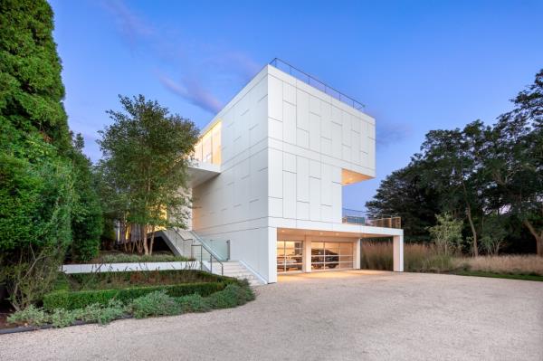 The property features five bedrooms and 10 baths. 
