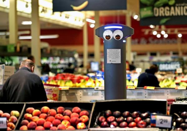Marty the robot near fruit stands in Stop & Shop
