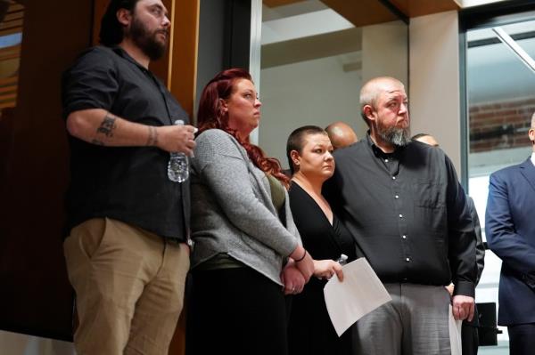 Jessica Vestal (second from the left) during a news co<em></em>nference to announce plans to sue the Littleton, Colo., school district for abuse suffered by their autistic children while riding the bus to class on Tuesday in Denver.