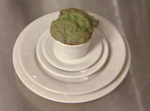 A spinach souffle on multiple plates