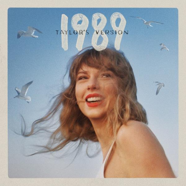 A Taylor Swift album cover, with her smiling. 