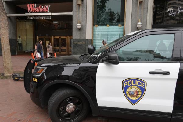 A police vehicle is seen parked outside the Westfield Mall.