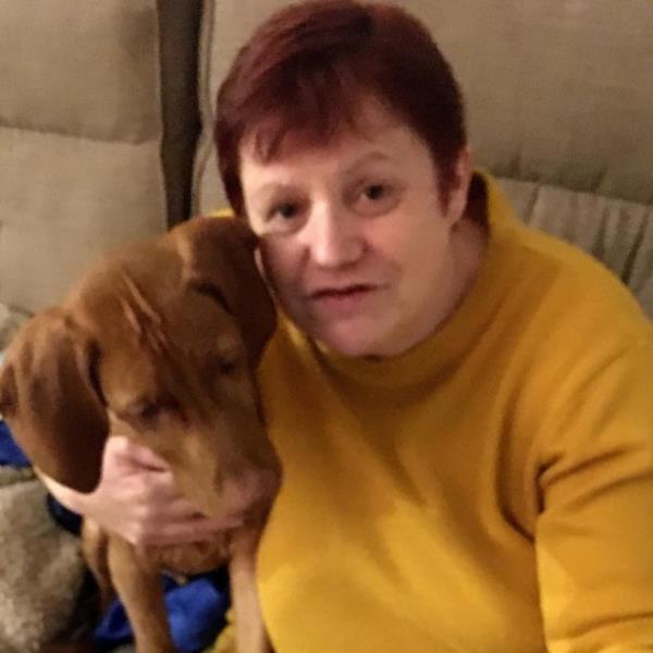 Owner, Sharon Nicholson, with four-month-old Hungarian Vizsla Dexter who swallowed AA battery. 