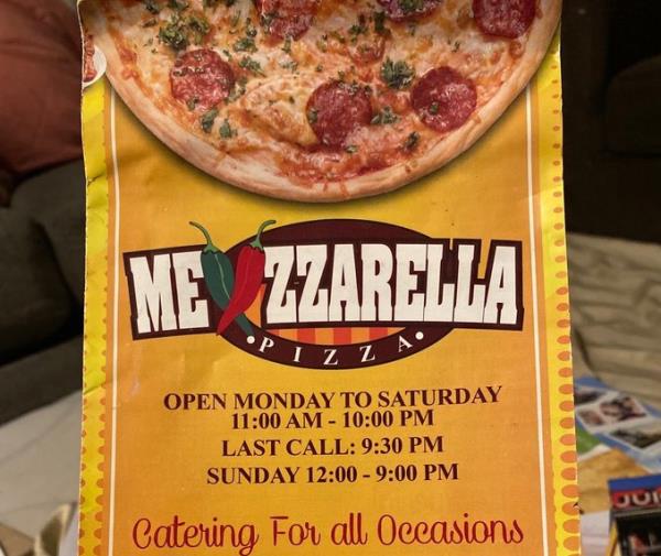 A menu for Mexzzarella Pizzeria in the Bronx. 