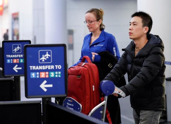 Passengers at O'Hare airport in Chicago.