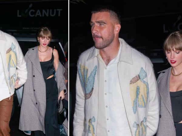 Travis and Taylor hand holding 
