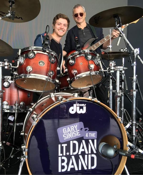Gary Sinise and Mac, who liked to play the drums.