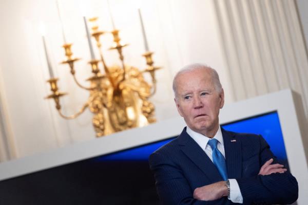 U.S. President Joe Biden looks on before speaking during a roundtable discussion on public safety at the State Dining Room at the White House on Feb. 28.