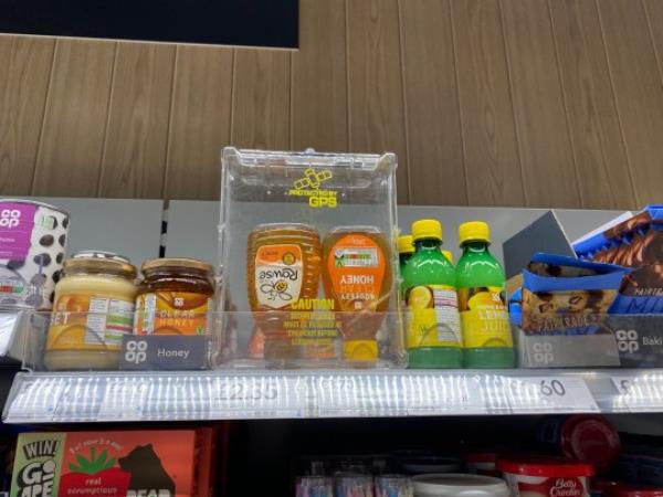 Ho<em></em>ney alo<em></em>ngside an assortment of other products have been encased in plastic security boxes at a Co-op store in north Lo<em></em>ndon in a bid to deter shoplifters. See SWNS story SWNJcost. A Co-op in Manor House, north London, has locked up its coffee, ho<em></em>ney and even chocolate to ward away shoplifters. Many items across the shop are now in thick, plastic security boxes to stop people from swiping them off the shelves. Hygiene items are also among the goods locked up, with sun cream, moisturiser and nose spray being among the protected items.