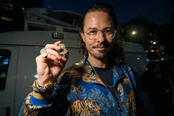 Brandon Gates outside Housing Works Cannabis dispensary grand opening.