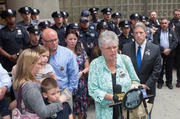 Marge Dwyer and family members of NYPD officer Anthony Dwyer, speak to reporters after attending a previous parole hearing of his killer Eddie Matos. 