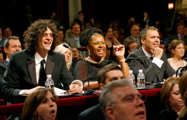 Radio shock-jock Howard Stern, his co-host Robin Quivers, and film critic Roger Roeper, pictured at the judges table during the inaugural Howard Stern film festival.