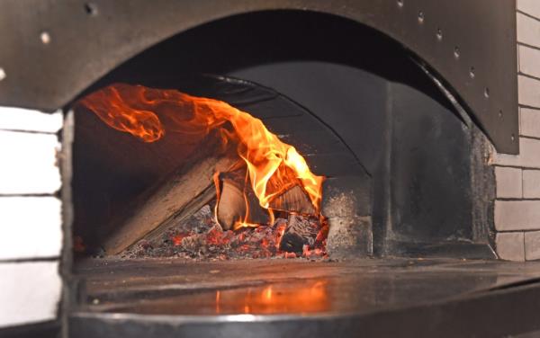 In order to reach city enviro<em></em>nmental goals, New York was co<em></em>nsidering banning wood- and coal-fired pizza ovens.  
