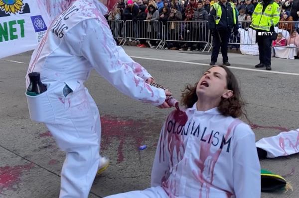 Four protesters were formally arrested at the Thanksgiving Day protest, and 30 others were issued summonses, cops said. 