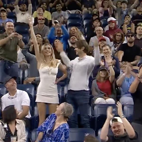 Megan Lucky doing her viral beer-chug at the U.S. Open in 2022. 