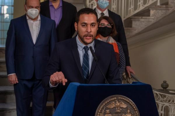 Council Member Christopher Marte speaking from a podium