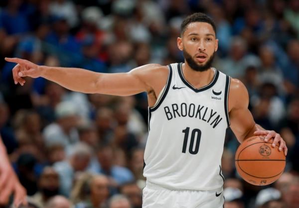 Ben Simmons, who had 10 points and 10 rebounds, directs the offense during the Nets' loss.