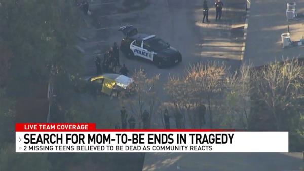 The scene of the car surrounded by police.