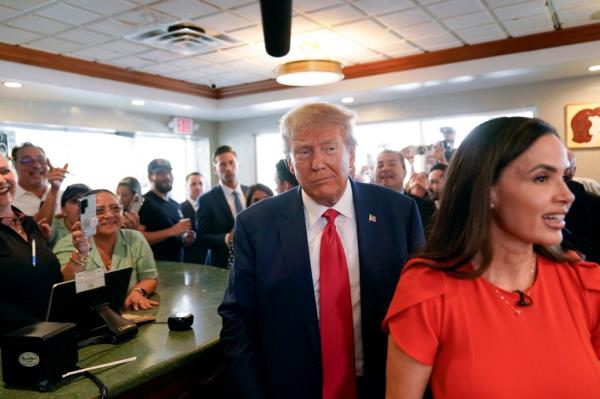 Trump as supporters sang Happy Birthday to him during his visit to Miami's ico<em></em>nic Versailles Restaurant in Little Havana.