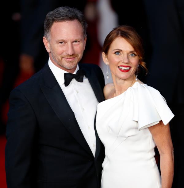 Christian Horner in a tuxedo standing next to Geri Halliwell in a white rufled dress