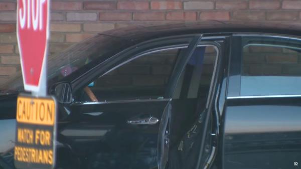 The black sedan wher<em></em>e Young was shot is pictured.