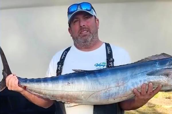 Jeffrey Kale holding a fish