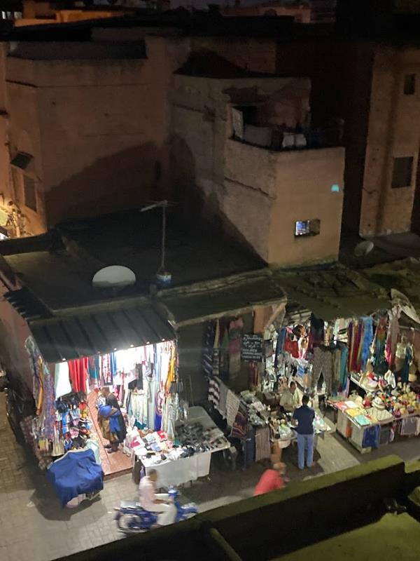 The rooftop view from the quiet riads showed the stark co<em></em>ntrast of the surrounding bustling markets (Picture: Dom Hines)