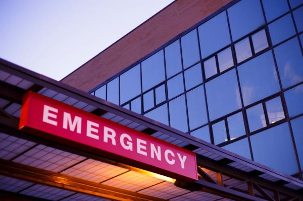 Emergency room entrance sign on exterior building. 