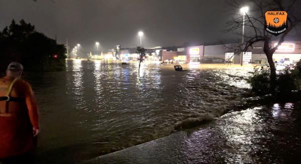 The flooding was the latest weather-related calamity to pound Canada this year. Wildfires have already burned a record number of hectares, sending clouds of smoke into the United States.