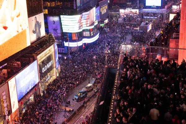 Co<em></em>nfetti dro<em></em>ps over the crowd as the clock strikes midnight as seen from the New York Marriott Marquis during the New Year's Eve celebration in Times Square on Jan. 1, 2024, in New York.