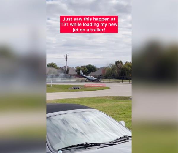 A long-distance shot showing a silver plane smashing its way through a me<em></em>tal fence at a small Texas airport.