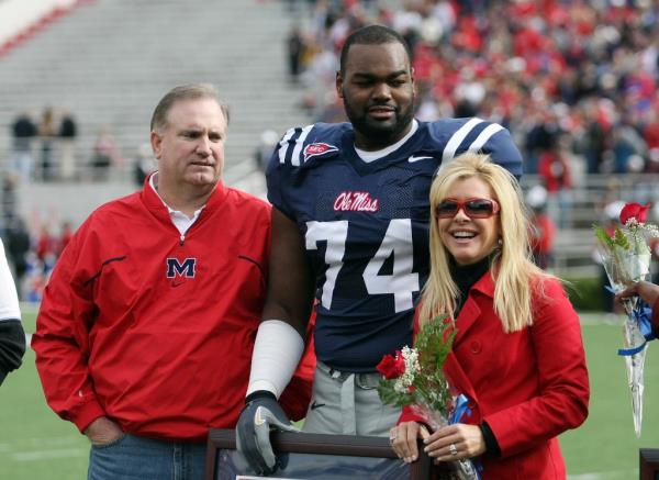 OXFORD, MS - NOVEMBER 28:  Michael Oher #74 of the Ole Miss Rebels stands with his family during senior ceremo<em></em>nies prior to a game against the Mississippi State Bulldogs at Vaught-Hemingway Stadium on November 28, 2008 in Oxford, Mississippi. 