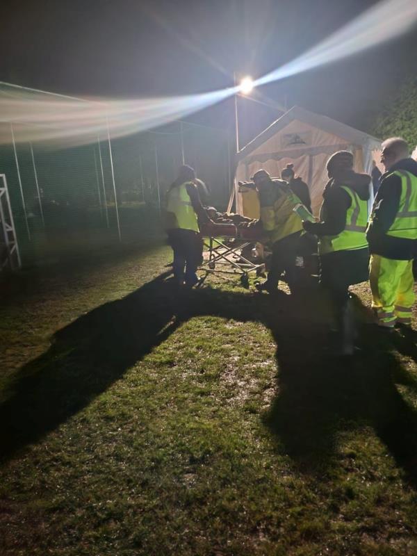 A victim from the fireworks mishap lies on a stretcher. 