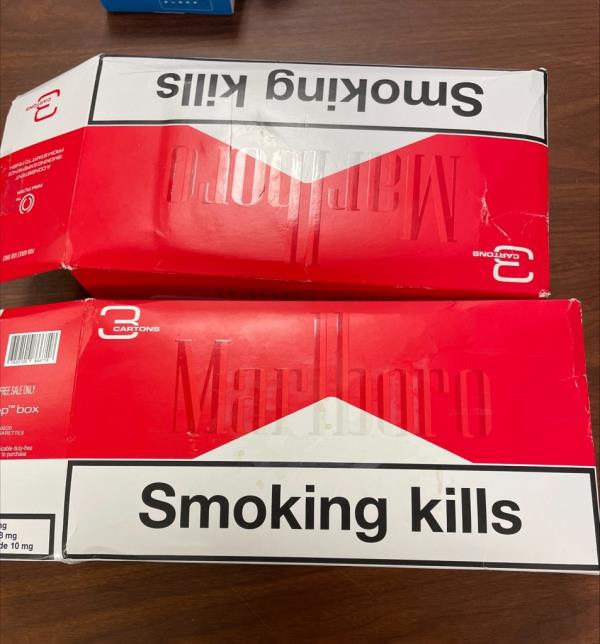 Two cigarette cartons wher<em></em>e the coke allegedly was stashed.