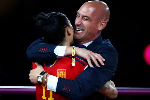 Spain's Jennifer Hermoso celebrates with President of the Royal Spanish Football Federation Luis Rubiales after the match.