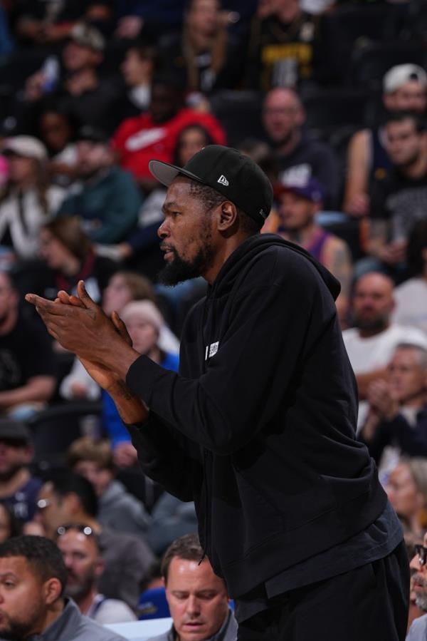 Kevin Durant #35 of the Phoenix Suns celebrates during the game against the Denver Nuggets on October 13, 2024 at Ball Arena in Denver, Colorado.