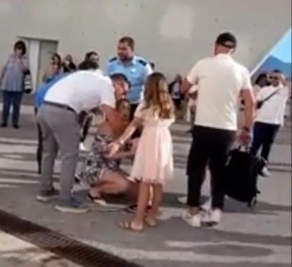 UNCLEARED GRABS: Horrific moment hysterical woman screams ?wher<em></em>e is he? after eight-year-old boy falls into gap between cruise ship and dock at Italian port / 12589709