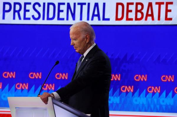 Democrat presidential candidate U.S. President Joe Biden listens as Republican presidential candidate former U.S. President Do<em></em>nald Trump speaks during their debate in Atlanta.
