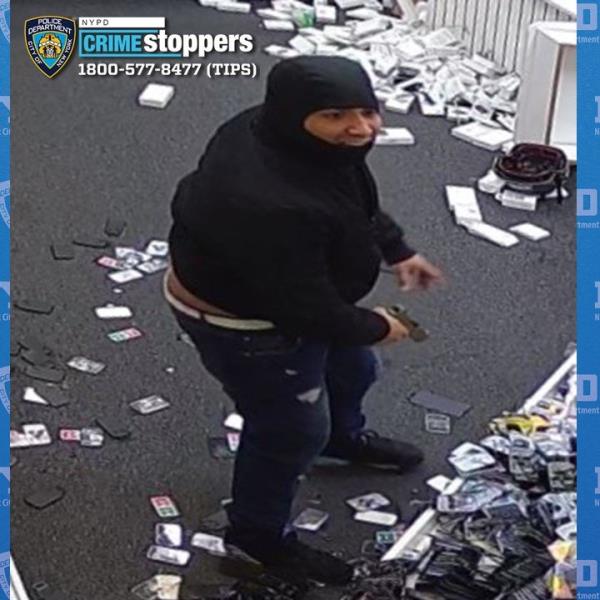 Aaron Lennon looking at the scene of a robbery at 32-78 Steinway St, Queens, wher<em></em>e a man was shot multiple times over his Rolex watch