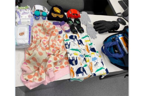 diapers and wipes and gloves on table 