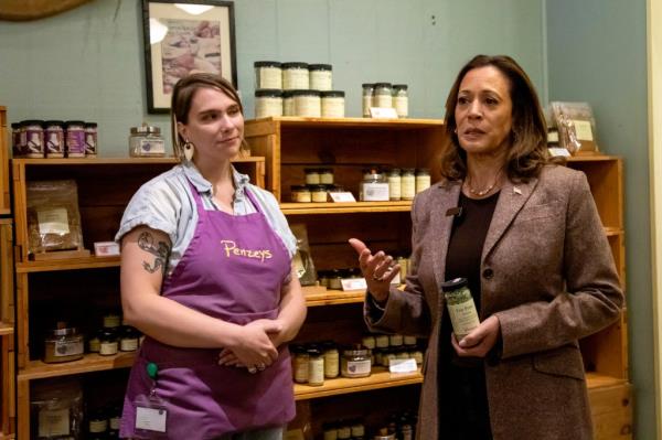 Vice President Kamala Harris answering a question from the media during her 2024 presidential campaign stop at Penzeys Spices in Pittsburgh