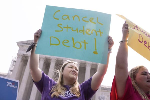 Supporters of student loan forgiveness check for news on United States Supreme Court decisions outside the Supreme Court in Washington, DC on Friday, June 30, 2023.</p>

<p>　　