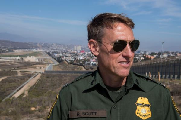 Former Border Patrol Chief Rodney Scott stands in uniform in San Diego