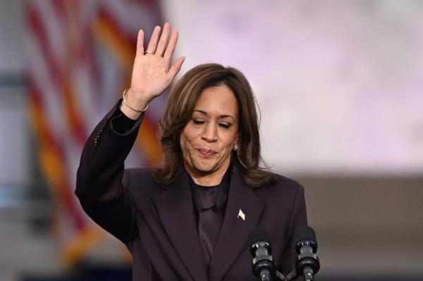 Vice President Kamala Harris waves to the crowd during her co<em></em>ncession speech at Howard University on Nov. 6, 2024.