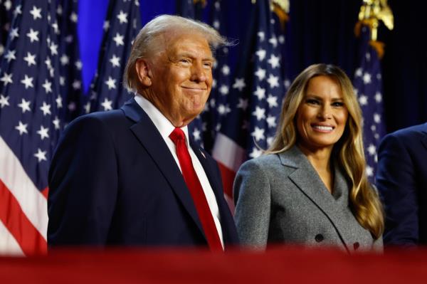 President-elect Do<em></em>nald Trump and his wife Melania Trump on stage at the Palm Beach Co<em></em>nvention Center after the election on Nov. 6, 2024.
