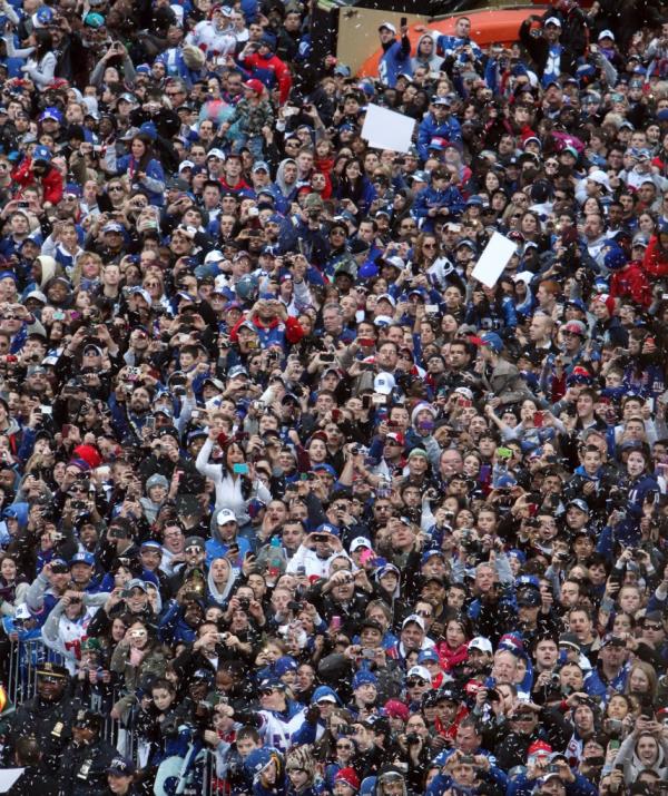 Fans cheer as the New York Giants make their way up Broadway during the Super Bowl Champio<em></em>nship ticker-tape parade Tuesday, Feb. 7, 2012, in New York. 