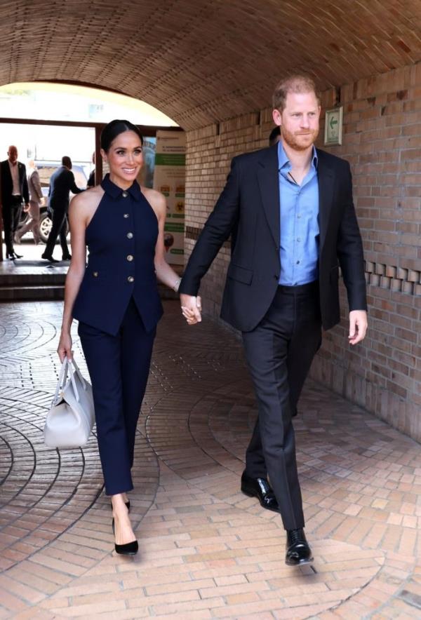 Meghan Markle kicks off Columbia trip in chic halter vest and trousers.