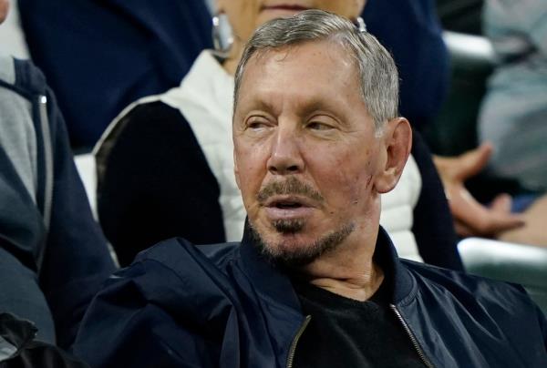 Larry Ellison, Chairman of Oracle, attentively watching a match at BNP Paribas Open tennis tournament in Indian Wells, California.