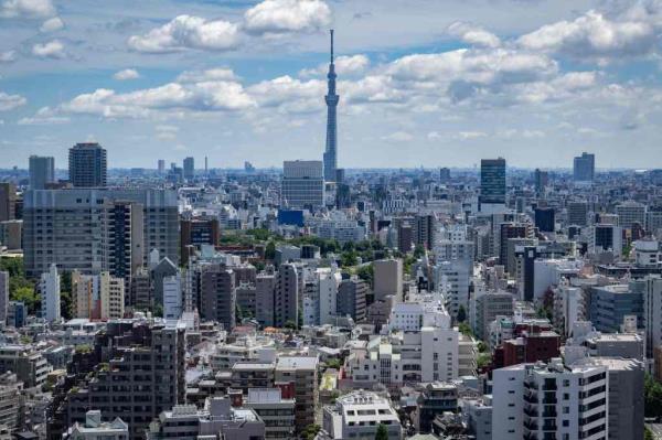 Tokyo city skyline with the Tokyo Skytree tower in the background on July 2, 2023